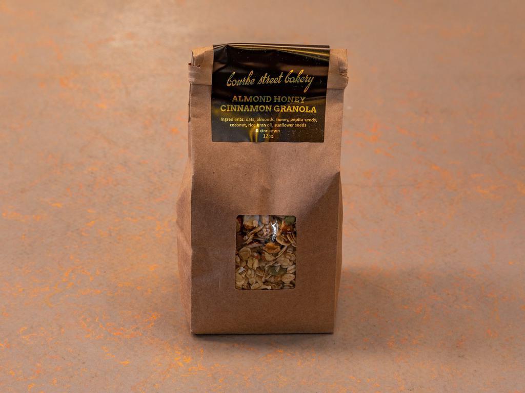 Almond Honey Granola · Housemade granola is oven baked with oats, cinnamon, pepita seeds, almonds, honey, sunflower seeds, coconut and rice bran oil.