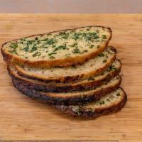 Sourdough Confit Garlic Bread with Herbs (Frozen) · 900 gram. Serves frozen. Sliced organic white sourdough with confit garlic, salt, rosemary, ...