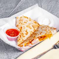 Shrimp Quesadilla · Spicy tomato and cheddar -jack cheese with salsa and sour cream on side.