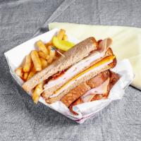 Turkey Club Sandwich · Smoked turkey, bacon, cheddar and provolone cheeses, lettuce, tomato, and mayo. Choice of to...