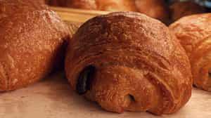 Chocolate Croissant · A chocolate-filled, golden, buttery, layered and flaky textured croissant, delicious, light ...