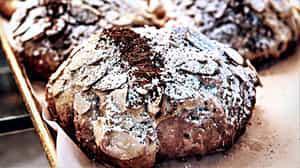 Almond and Chocolate Croissant · Chocolate croissant filled with almond cream filling and chocolate pieces, topped with roast...