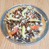 Tostadas · Traditional tostada with repollo, black beans, tomatoes, avocado, fresh cheese and your choi...