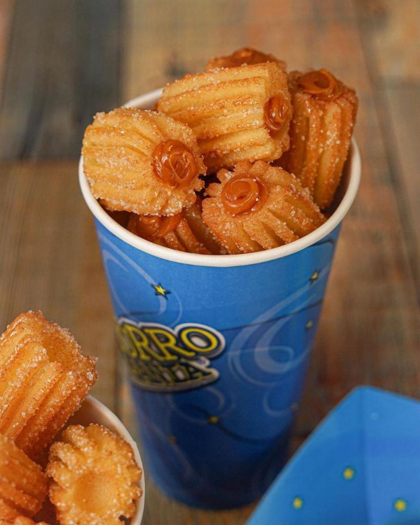 ChurroBites Filled · Delicious churro bites covered in sugar and filled with your favorite topping. 22 oz cup