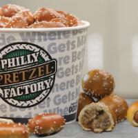 Family Pack · Bucket of Rivets, 8 Mini Cheesesteaks, 8 Mini Dogs and 1 large Dip