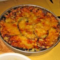 Melanzane alla Parmigiano Rivisitata	 · Oven baked eggplant, san marzano tomato, parmigiano cheese, mozzarella, basil