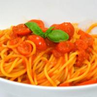 Spaghetti Alla Chitarra al  Pomodoro Fresco e Basilico ·  Square Spaghetti with San Marzano tomato sauce and  basil (Vegeterian)