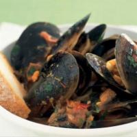 Greek Mussels · Mussels sauteed in a red feta sauce.