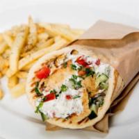 Chicken Gyro Sandwich · Topped with lettuce, tomato and onion.