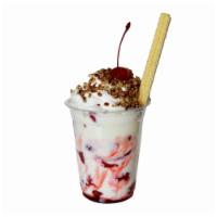 Fresas Con Crema · Strawberries and cream topped with whipped cream and choice of granola, almonds, or pecans.