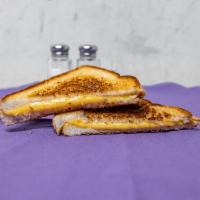 Grilled Cheese Sandwich · Grilled cheese prepared on toasted slice bread with butter.
