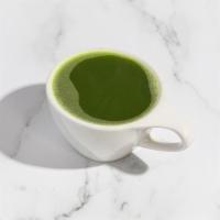 Matcha Tea ·  Kilogram Tea's luxurious organic matcha whisked to a froth with hot water.