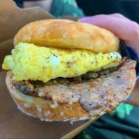 Sausage, Egg and Cheese Sandwich  · Sausage patty, folded egg and American cheese between a Dough Boy donut