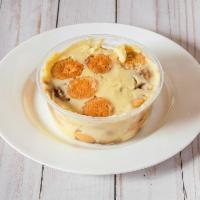 Banana Pudding · Creamy vanilla custard made in house. Complimented by Real sliced bananas and a couple layer...
