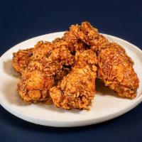 WINGS 10 PIECES · Choice of one sauce,
'Original Golden Crispy' flavor is a plain chicken without sauce. 