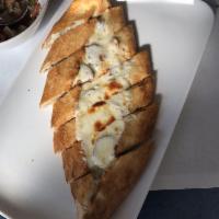 Mixed Pide · i sausage, mozzarella cheese and ground meat topped with mozzarella cheese. Stuffed dough di...