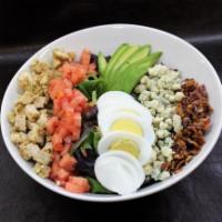 Cobb Salad · Chicken breast, avocado, crispy bacon, chopped hard-boiled egg, crumbled bleu cheese, and di...