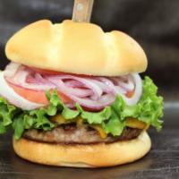 Cheeseburger · Our juicy 1/3lb beef burger, topped with melted aged cheddar cheese.