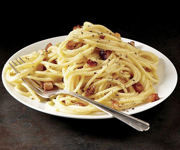 Pasta Carbonara · Pasta with carbonara sauce is a fundamentally simple and easy dish, made by coating pasta in a rich, creamy sauce of eggs, cheese, pork, and black pepper.
