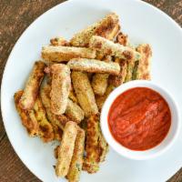 Zucchini Sticks · Crisp, tender zucchini sticks deep-fried to absolute perfection. It's healthy, nutritious an...