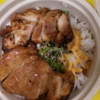 Chicken Teriyaki Bowl · Chicken teriyaki, white rice, green mix, edamame, fried onions, green onions, pineapple, ses...