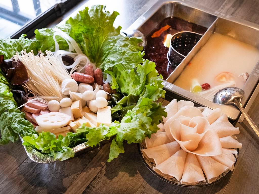 Chicken Hot Pot for 2 双人鸡肉锅 · Includes 1 order of chicken, lettuce, wood ear fungus, seaweed knot, Flammulina mushroom, mini sausage, fish tofu, lotus root, frozen tofu, fish roe ball, fish ball, luncheon meat, quail egg, Sichuan vermicelli, and fresh mushroom.