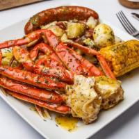 Just Crabs · 2 corn, 2 eggs, 2 sausages and potatoes.