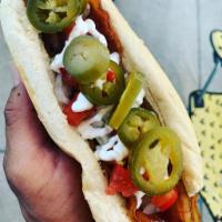 Chihuahua Dog · All Beef Hot Dog topped with bacon, sour cream, tomato, onions and jalapenos.