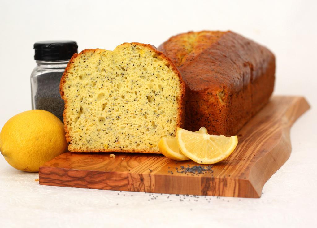 Low Fat Lemon Poppy Seed Bread · Lemon, abundant poppy seeds and applesauce swirled into a low fat frenzy. Full large loaf ready to slice as you wish. Made in a facility that uses dairy, eggs, nuts, and wheat products.
