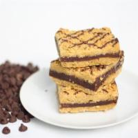 Chocolate Truffle Bar · Generous filling of rich chocolate ganache sandwiched between wholesome sweet oatmeal crumbl...