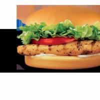 Grilled Chicken Sandwich · Juicy all-white meat chicken breast topped with crispy lettuce, ripe tomatoes, and salad dre...