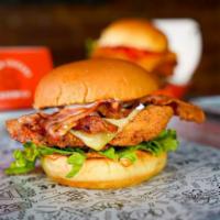 Swiss ’n Bacon Sandwich · Potato Roll, Buttermilk Fried Chicken, Swiss cheese, Honey Mustard, Roasted Garlic Aioli, Ba...