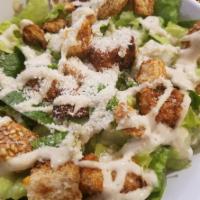 Caesar Salad · Classic Caesar salad with croutons, dressing on the side.