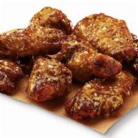 Garlic Parmesan Caesar Wings® · Oven roasted wings with a creamy garlic parmesan sauce..