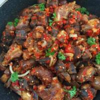 Asun · Spicy goat meat.