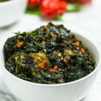 Efo Riro · Served with pounded yam, eba or amala with mixed soup.