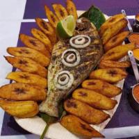 Grilled Fish · Whole tilapia. Tilapia prepared with assorted vegetables.