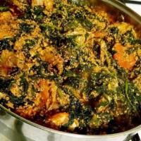 Egusi · Rich soup made from melon seeds blended with leafy vegetable.