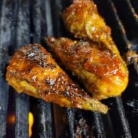 Vegan Jerked Citrus Wings · Vegan jerked wings, marinade in our jerk herbs and spices, grilled and served with our citru...