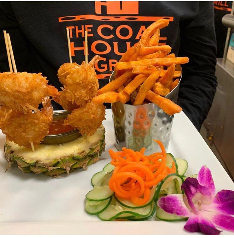 Coconut Shrimp · 6 jumbo shrimp coated in panko bread and coated with coconut flakes fried. Served with sweet potato fries.