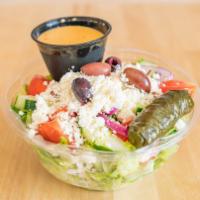 Greek Salad · Romaine, tomato, red onion, red and green peppers, cucumber, Kalamata olives, feta, dolmades