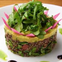 Quinoa Avocado Salad · Pomegranate dressing and olive oil.