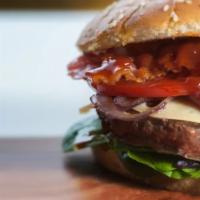 Kwikees Cheeseburger · USDA choice top rounds 1/4 lb. beef. Served with mayo, ketchup, onion, lettuce, tomato and p...