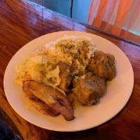 Curry Chicken · Served with rice and peas, white rice or mac and cheese, salad or veggies and plantains.