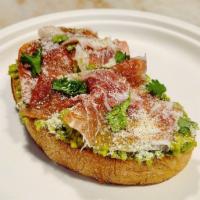 The Prosciutto Avocado Toast · Mashed avocado, freshly squeezed lemon, thinly sliced prosciutto, drizzle of honey, Parmesan...