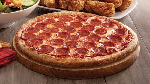 Pepperoni Pizza · Our classic cheese pizza topped with generous helping of pepperoni.