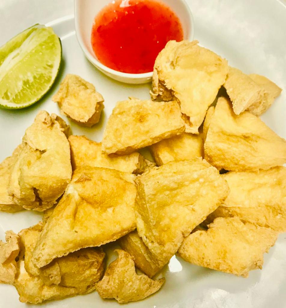 16. Tao Hoo Todd · Deep fried tofu served with a sweet chili sauce.