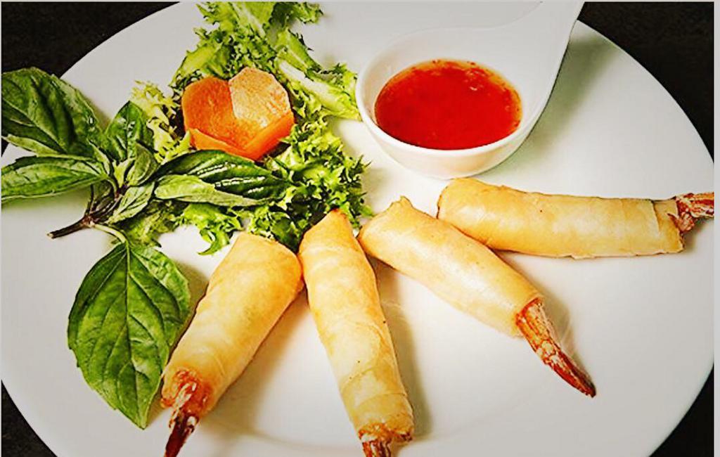 17. Shrimp Mermaid · Deep fried marinated whole shrimps wrapped with egg roll skin, served with sweet chili sauce.