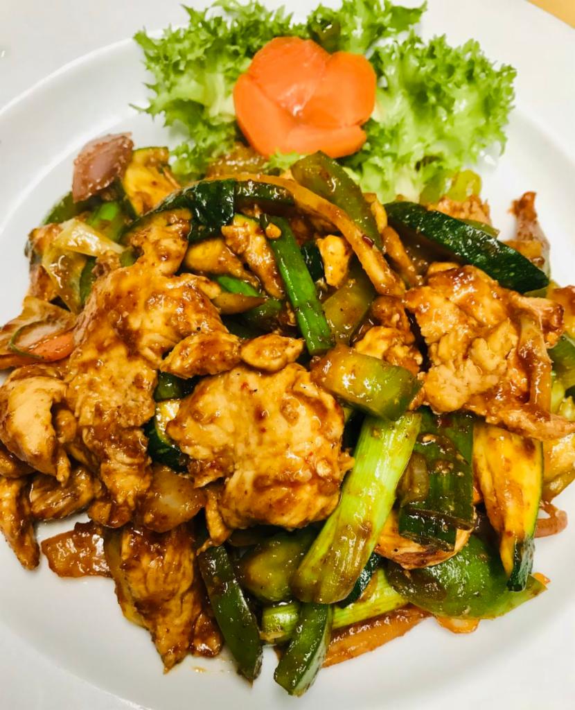 18. Gai Pad Bai Ga-Prow · Thai style spicy chicken with fresh sweet basil, pepper and Thai chili sauce. Hot and spicy.