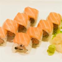 77. Salmon Lover Roll · Spicy salmon crunch inside with salmon on top.